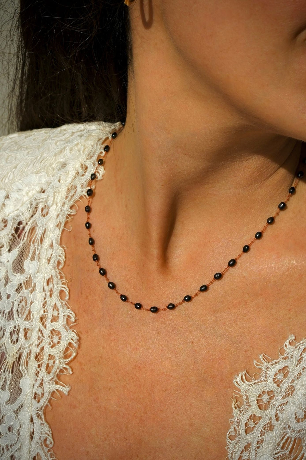 mini bird black necklace